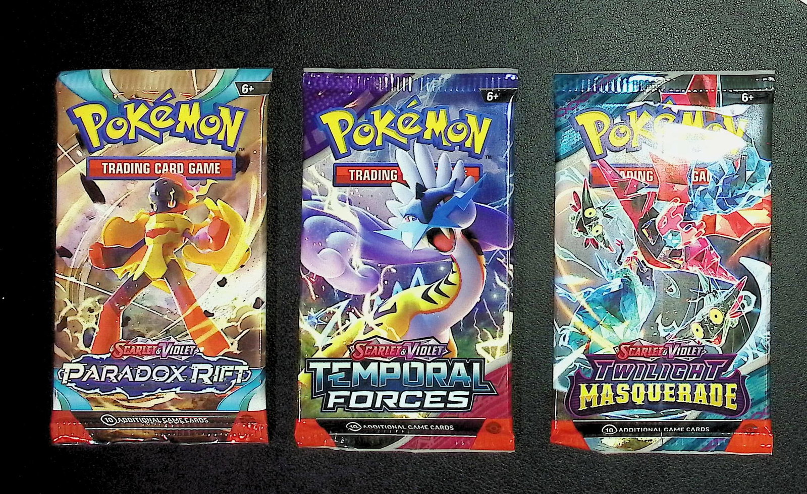 3 COUNT: 1 - Pokemon Paradox Rift, 1 - Temporal Forces, & 1 - Twilight Masquerade Booster Packs: Pokemon Trading Card Game Cards, Charizard, Pikachu, Mewto, EX, Referse Holo, Holo Rare Cards, Secret Rare Cards, Full Art Cards, Evee, 3 Stars Ultra Rare Cards, Double Rare, Illustration Rare, Specia