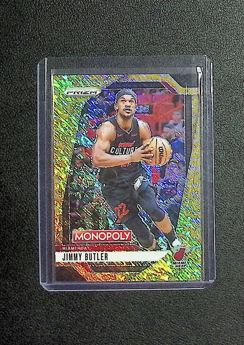 Jimmy Butler Gold Millionaire Shimmer /500 2024-25 Panini Prizm Monopoly #28: Panini Select, Prizm, Mosaic, Contenders, Revolution, Phoenix, NBA Hoops, Rookie NFL Sports Trading Cards, Silver, SP, SSP, Wave Prizms, Numbered Cards, Basketball sports Cards for Sale Near Me, NBA C