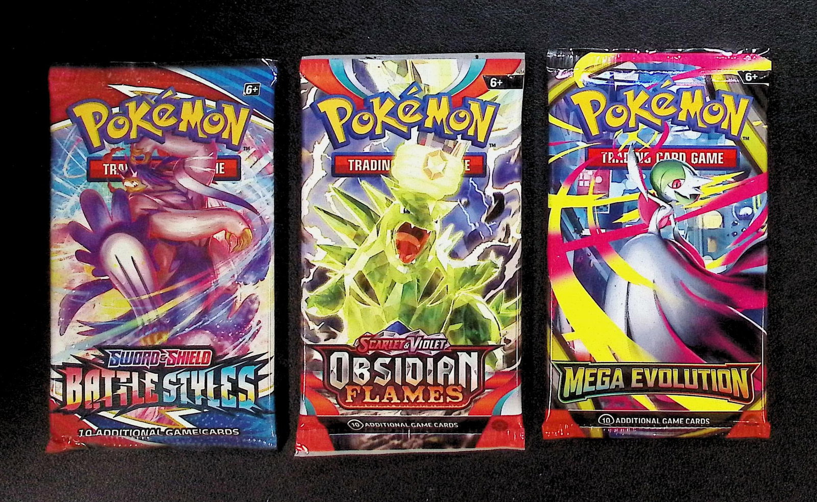 3 COUNT: 1 - Pokemon Battle Styles, 1 - Obsidian Flames, & 1 - Mega Evolution Booster Packs: Pokemon Trading Card Game Cards, Charizard, Pikachu, Mewto, EX, Referse Holo, Holo Rare Cards, Secret Rare Cards, Full Art Cards, Evee, 3 Stars Ultra Rare Cards, Double Rare, Illustration Rare, Specia