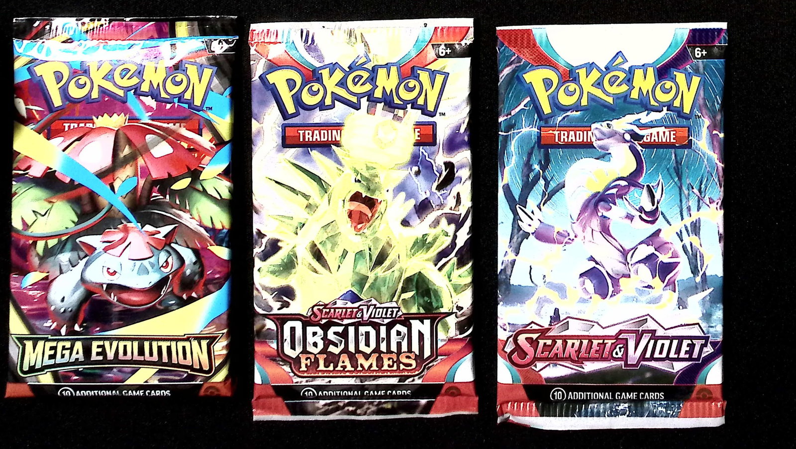 3 COUNT: 1 - Pokemon Mega Evolution, 1 - Obsidian Flames, & 1 - Scarlet & Violet Booster Packs: Pokemon Trading Card Game Cards, Charizard, Pikachu, Mewto, EX, Referse Holo, Holo Rare Cards, Secret Rare Cards, Full Art Cards, Evee, 3 Stars Ultra Rare Cards, Double Rare, Illustration Rare, Specia