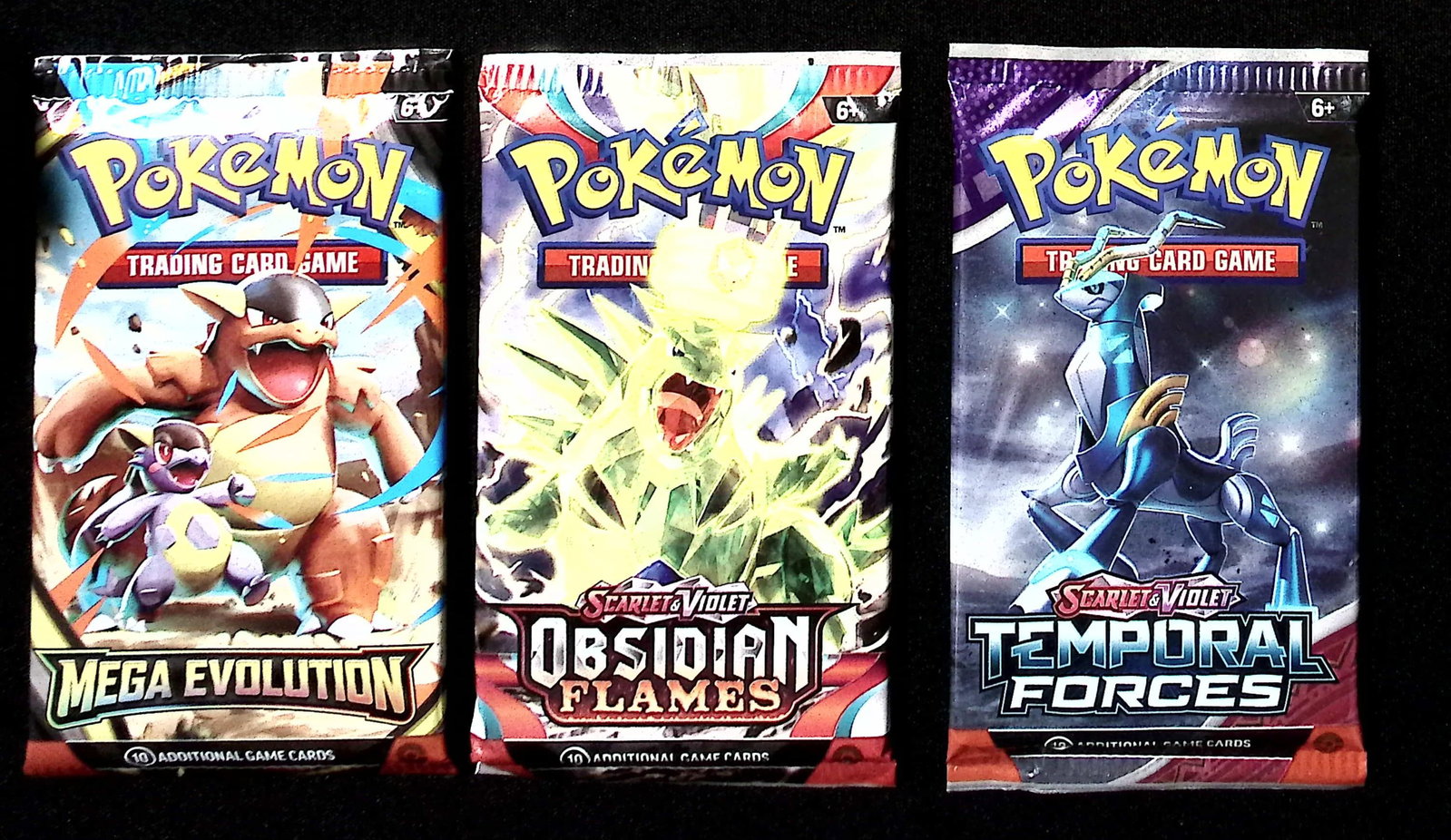 3 COUNT: 1 - Pokemon Mega Evolution, 1 - Obsidian Flames, & 1 - Temporal Forces Booster Packs: Pokemon Trading Card Game Cards, Charizard, Pikachu, Mewto, EX, Referse Holo, Holo Rare Cards, Secret Rare Cards, Full Art Cards, Evee, 3 Stars Ultra Rare Cards, Double Rare, Illustration Rare, Specia