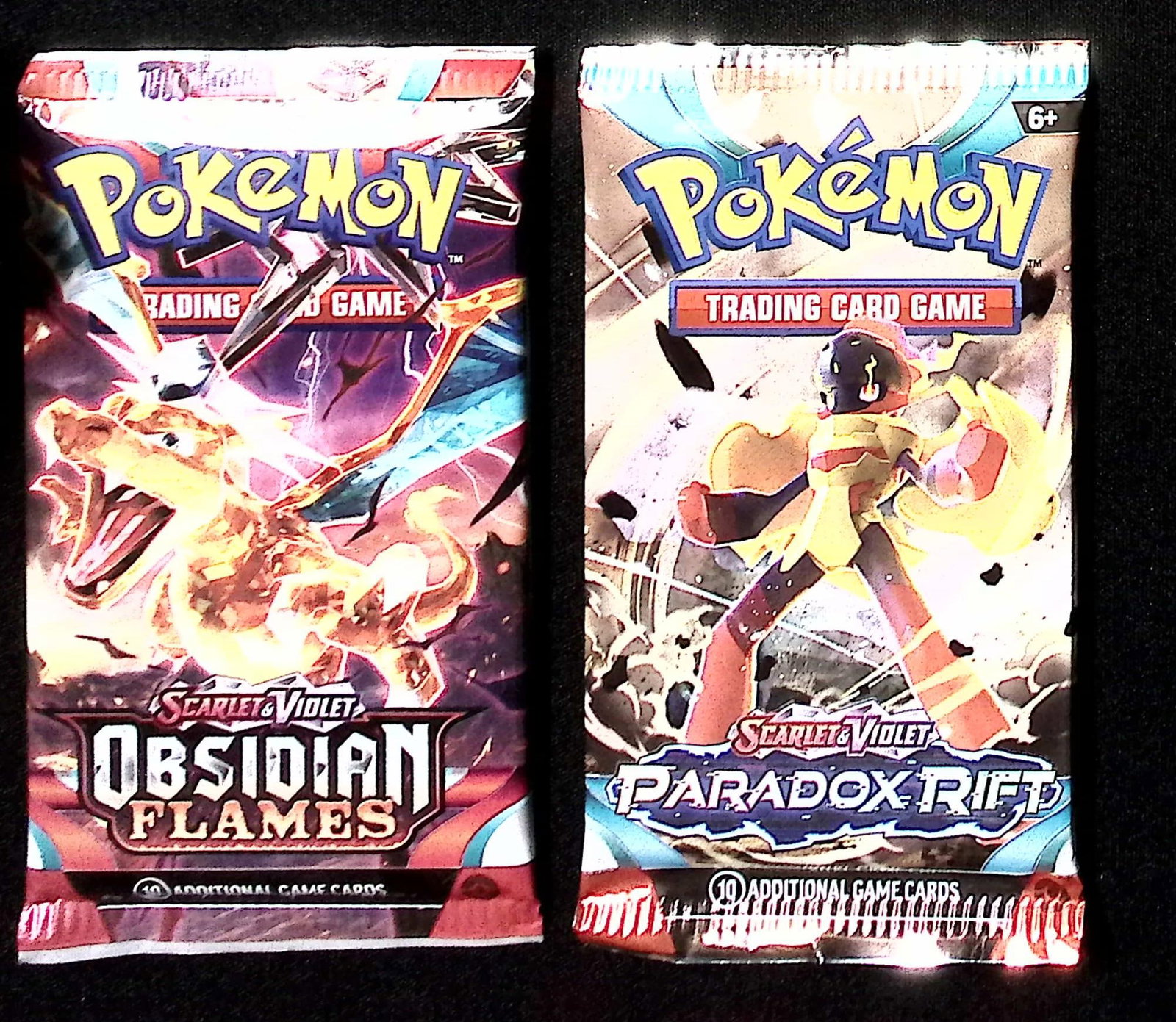 2 COUNT: 1 - Pokemon Obsidian Flames & 1 - Paradox Rift Booster Packs: Pokemon Trading Card Game Cards, Charizard, Pikachu, Mewto, EX, Referse Holo, Holo Rare Cards, Secret Rare Cards, Full Art Cards, Evee, 3 Stars Ultra Rare Cards, Double Rare, Illustration Rare, Specia