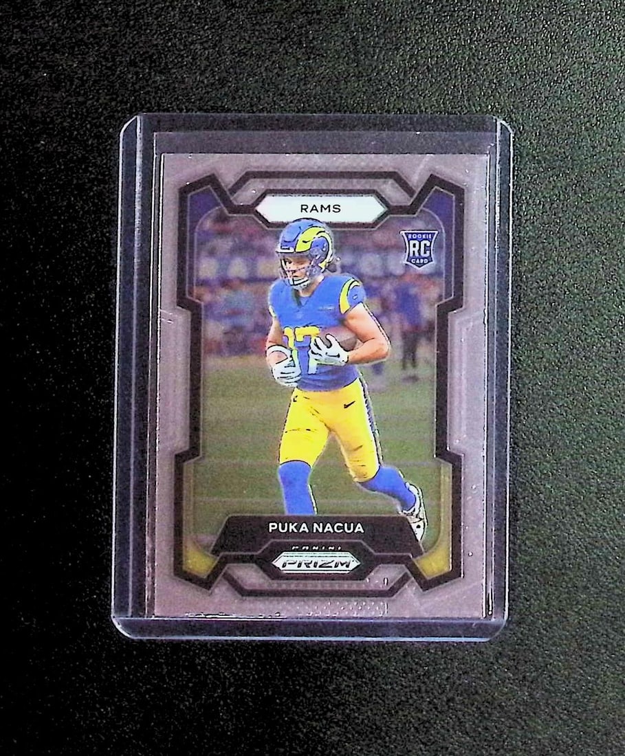 Puka Nacua Rookie Card 2023 Panini Prizm #357 Los Angeles Rams: Panini, Donruss Optic, & Donruss Select, Prizm, Mosaic, Contenders, Zenith, Phoenix, Illusions, Absolute, Rookie NFL Sports Trading Cards, SP, SSP, Cards, Football Cards for Sale Near Me, Superbowl & 