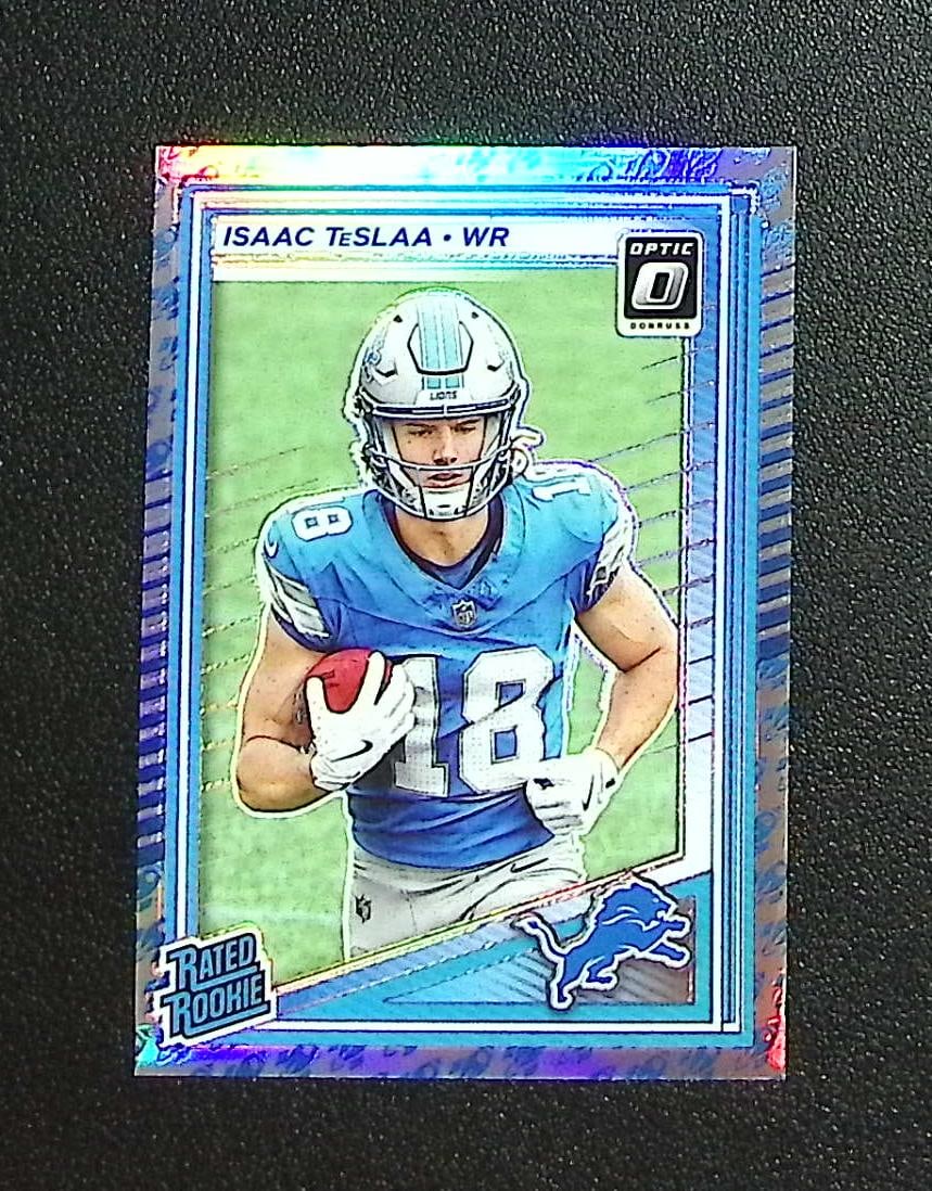 Isaac TeSlaa Rookie Card Rocket Emoji Prizm SSP 2025 Donruss Optic #219 Lions: Panini, Donruss Optic, & Donruss Select, Prizm, Mosaic, Contenders, Zenith, Phoenix, Illusions, Absolute, Rookie NFL Sports Trading Cards, SP, SSP, Cards, Football Cards for Sale Near Me, Superbowl & 