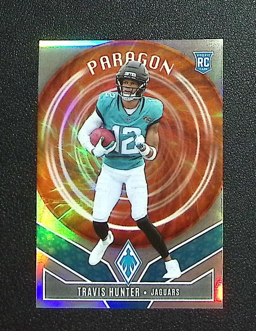 Travis Hunter Rookie Card Paragon 2025 Panini Phoenix #12 Jacksonville Jaguars: Panini, Donruss Optic, & Donruss Select, Prizm, Mosaic, Contenders, Zenith, Phoenix, Illusions, Absolute, Rookie NFL Sports Trading Cards, SP, SSP, Cards, Football Cards for Sale Near Me, Superbowl & 