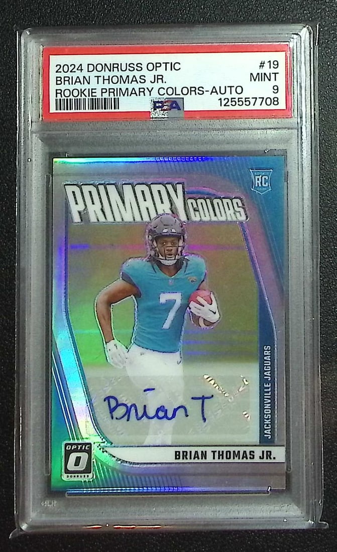 Brian Thomas Jr. Rookie Auto Prizm /99 2024 Donruss Optic #19 PSA 9 Jaguars: Panini, Donruss Optic, & Donruss Select, Prizm, Mosaic, Contenders, Zenith, Phoenix, Illusions, Absolute, Rookie NFL Sports Trading Cards, SP, SSP, Cards, Football Cards for Sale Near Me, Superbowl & 