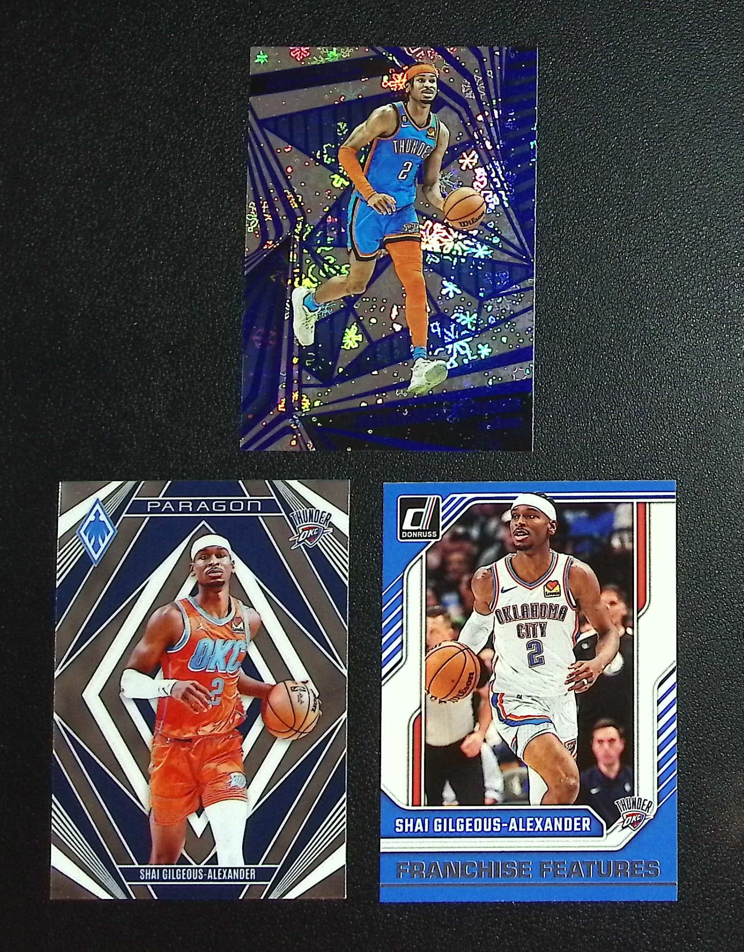 Lot of 3 Shai Gilgeous-Alexander Panini Basketball Cards. All Different, See Pictures: Panini, Donruss Optic, Donruss Select, Prizm, Mosaic, Contenders, Revolution, Phoenix, NBA Hoops, Rookie NFL Sports Trading Cards, Silver, SP, SSP, Wave Prizms, Numbered Cards, Basketball sports Cards