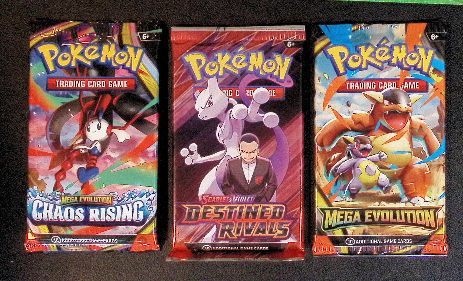3 COUNT: 1 - Pokemon Chaos Rising, 1 - Destined Rivals, & 1 - Mega Evolutions Booster Packs: Pokemon Trading Card Game Cards, Charizard, Pikachu, Mewto, EX, Referse Holo, Holo Rare Cards, Secret Rare Cards, Full Art Cards, Evee, 3 Stars Ultra Rare Cards, Double Rare, Illustration Rare, Specia