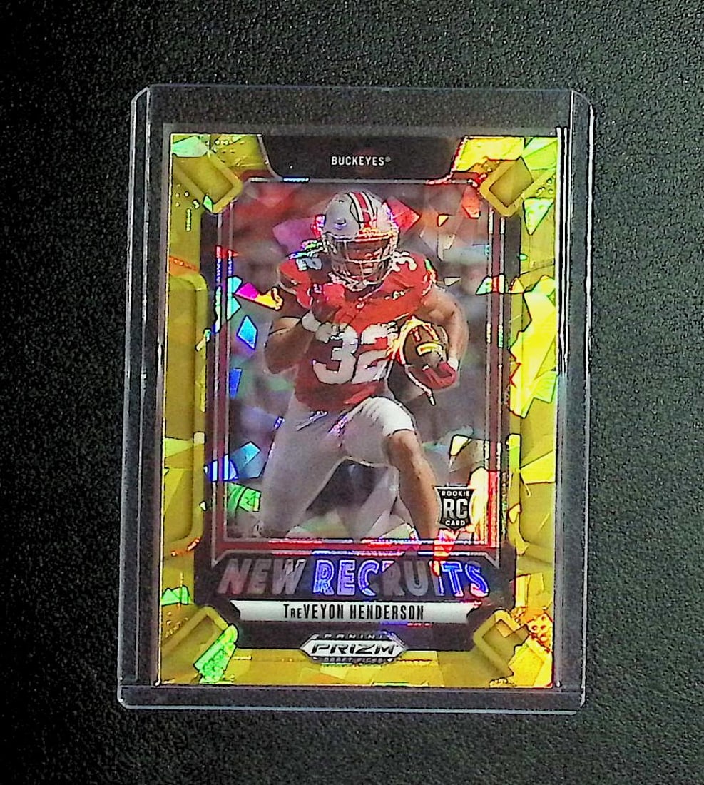 TreVeyon Henderson Rookie New Recruits Gold Cracked Ice Prizm 2025 Panini Prizm Draft Picks #1: Panini, Donruss Optic, & Donruss Select, Prizm, Mosaic, Contenders, Zenith, Phoenix, Illusions, Absolute, Rookie NFL Sports Trading Cards, SP, SSP, Cards, Football Cards for Sale Near Me, Superbowl & 