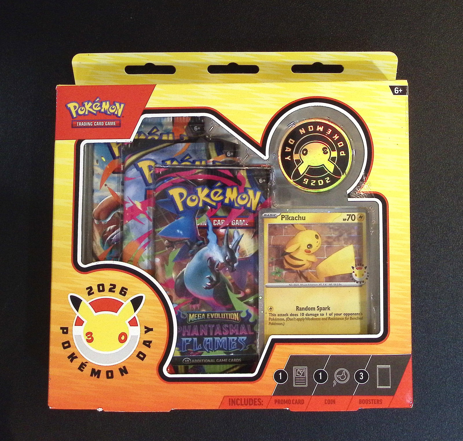 2026 Pokemon Collection Day. Contains 3 Phantasmal Flames Booster Packs: Pokemon Trading Card Game Cards, Charizard, Pikachu, Mewtwo, Reverse Holo, Holo Rare, Secret Rare Cards, Full Art Cards, Eevee, Ultra Rare Card, Illustration Rare, Special Illustration Rare SIR