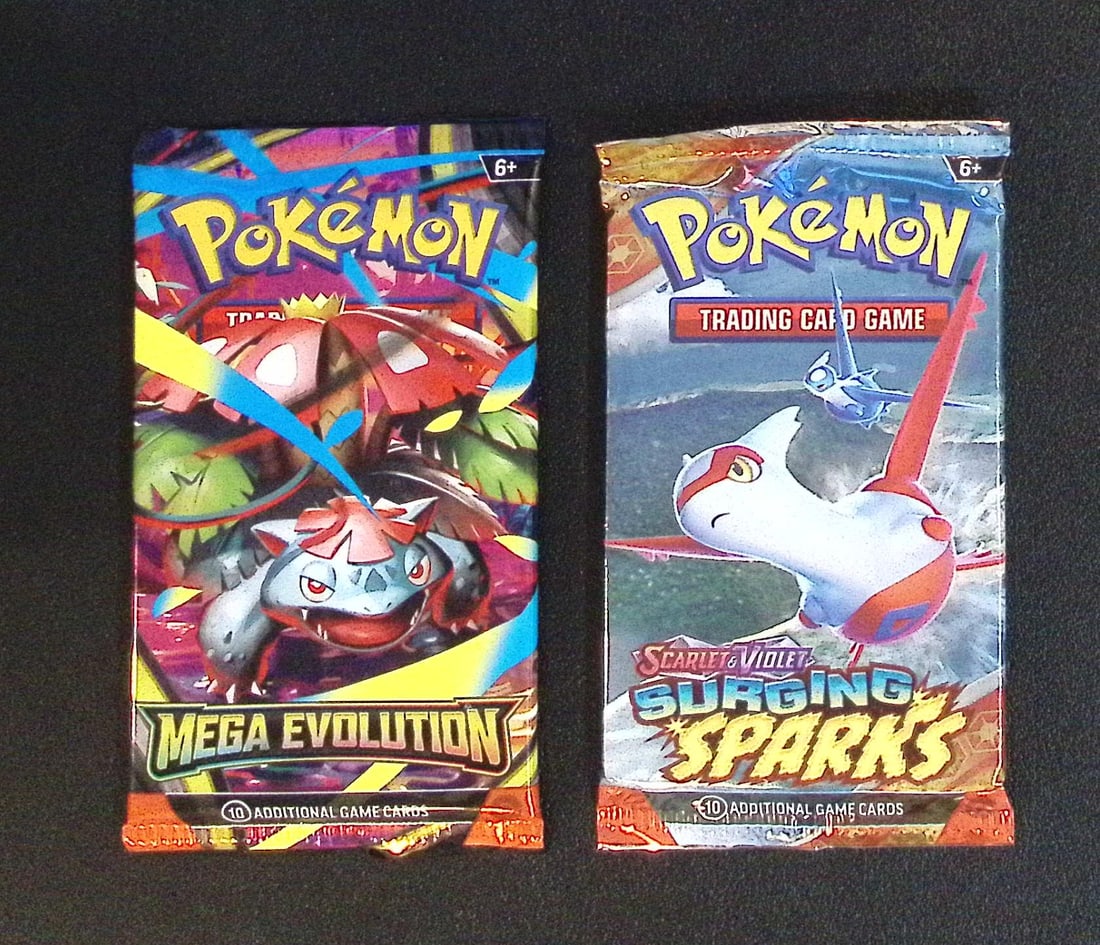 Lot of 2 Pokemon Booster Packs. 1 Mega Evolution Base Set & 1 Surging Sparks