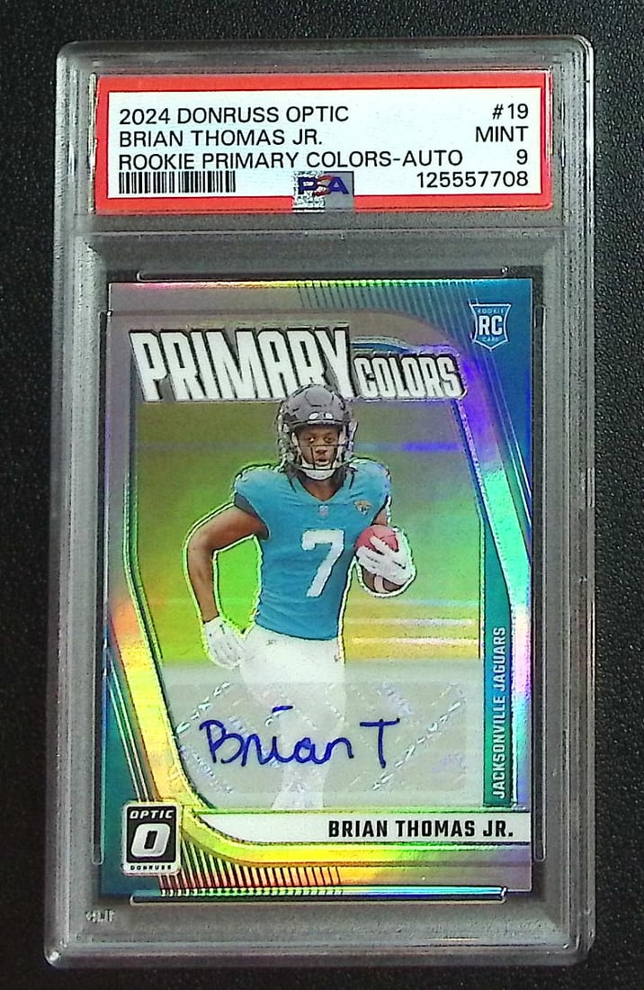 Brian Thomas Jr. Silver Rookie Auto /99 2024 Donruss Optic #19 PSA 9 Jaguars: Panini, Donruss Optic, & Donruss Select, Prizm, Mosaic, Contenders, Zenith, Phoenix, Illusions, Absolute, Rookie NFL Sports Trading Cards, SP, SSP, Cards, Football Cards for Sale Near Me, Superbowl & 