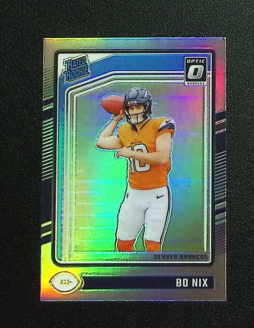 Bo Nix Rookie Card Holo Prizm 2024 Donruss Optic #209 Denver Broncos: Panini, Donruss Optic, & Donruss Select, Prizm, Mosaic, Contenders, Zenith, Phoenix, Illusions, Absolute, Rookie NFL Sports Trading Cards, SP, SSP, Cards, Football Cards for Sale Near Me, Superbowl & 