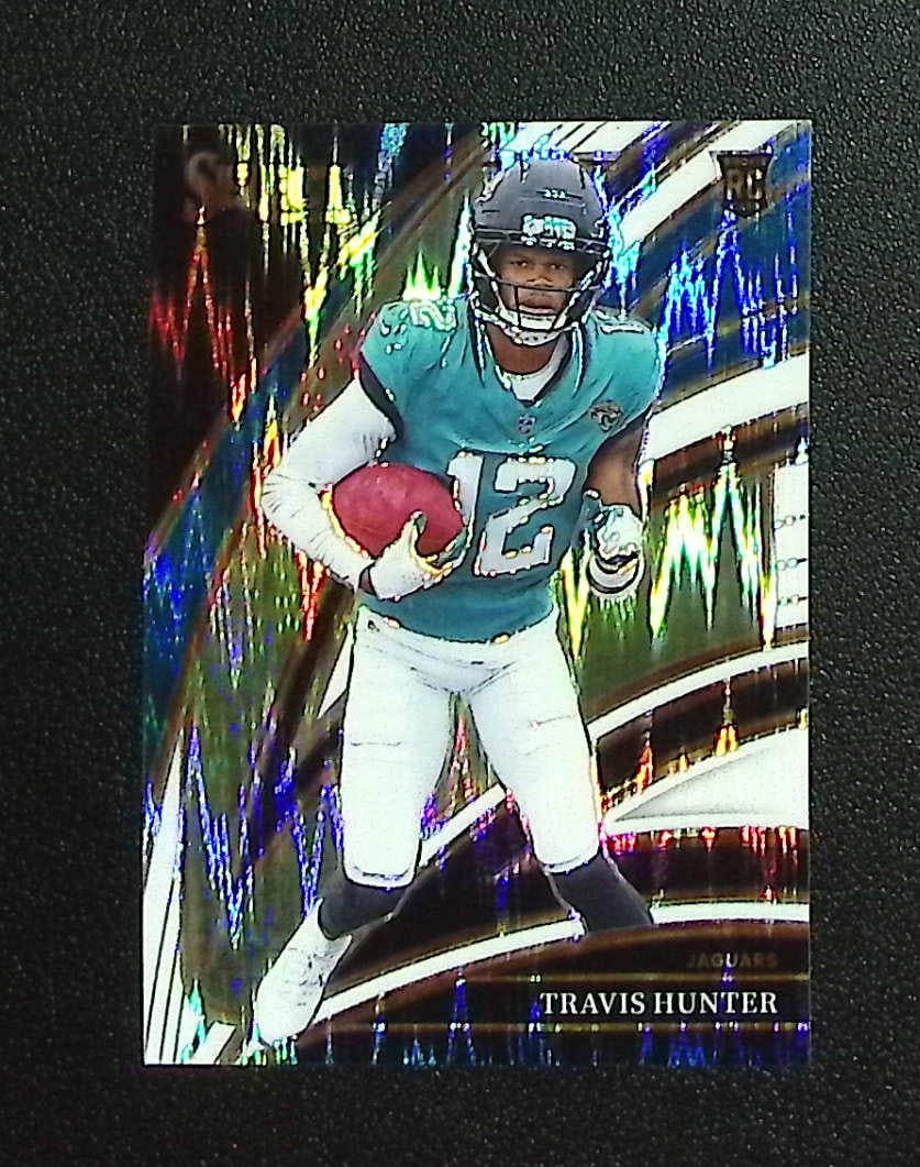 Travis Hunter Rookie Card White Shock Prizm /799 2025 Select #228 Jaguars: Panini, Donruss Optic, & Donruss Select, Prizm, Mosaic, Contenders, Zenith, Phoenix, Illusions, Absolute, Rookie NFL Sports Trading Cards, SP, SSP, Cards, Football Cards for Sale Near Me, Superbowl & 