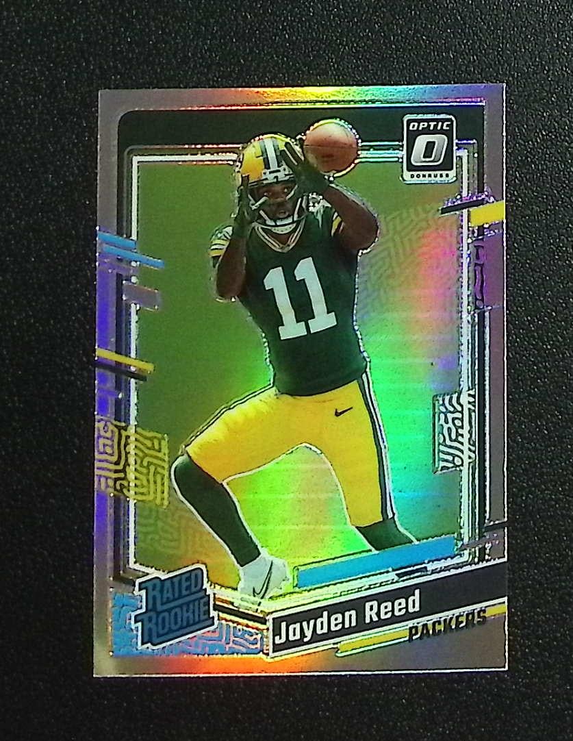 Jayden Reed Rookie Card Holo Prizm 2023 Donruss Optic #239 Green Bay Packers: Panini, Donruss Optic, & Donruss Select, Prizm, Mosaic, Contenders, Zenith, Phoenix, Illusions, Absolute, Rookie NFL Sports Trading Cards, SP, SSP, Cards, Football Cards for Sale Near Me, Superbowl & 