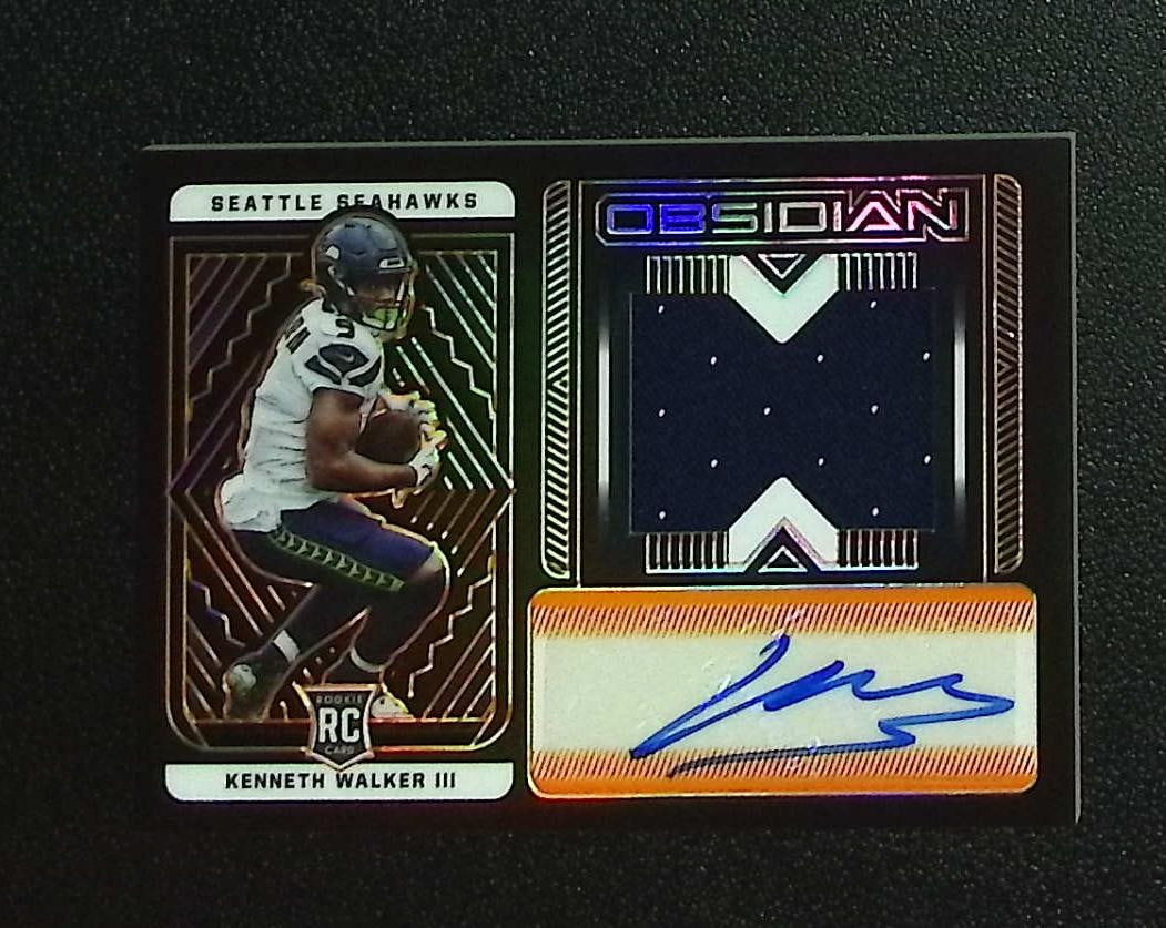 Kenneth Walker Rookie Patch Auto Electric Etch Orange Bookend 99/99 2022 Obsidian #214: Panini, Donruss Optic, & Donruss Select, Prizm, Mosaic, Contenders, Zenith, Phoenix, Illusions, Absolute, Rookie NFL Sports Trading Cards, SP, SSP, Cards, Football Cards for Sale Near Me, Superbowl & 