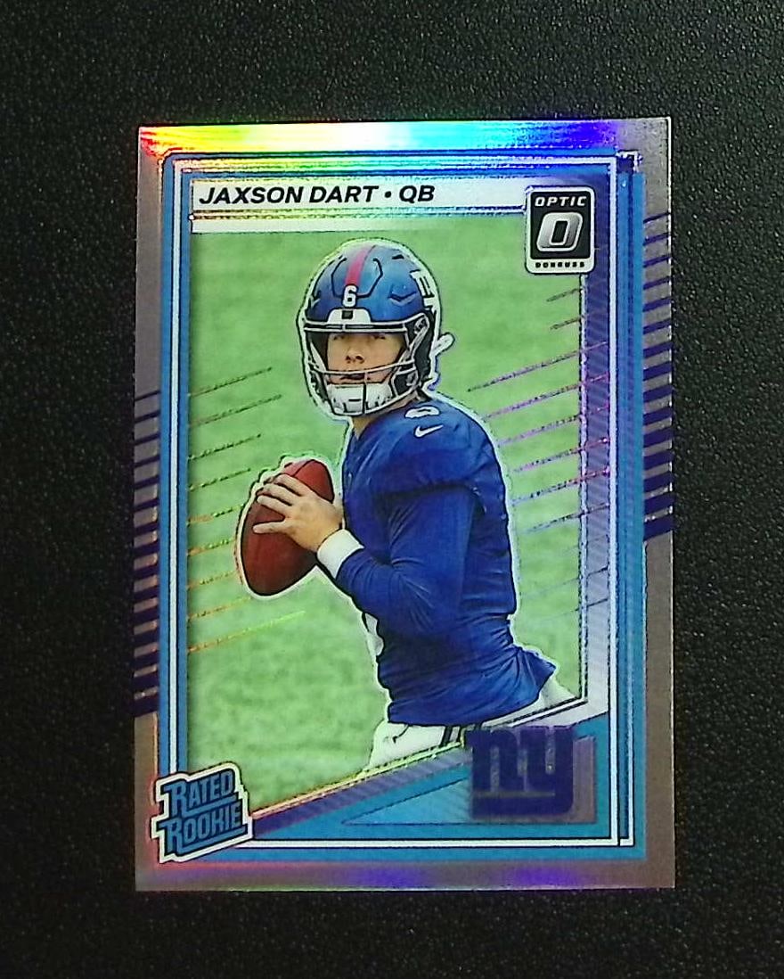 Jaxson Dart Rookie Card Holo Prizm 2025 Donruss Optic #273 New York Giants: Panini, Donruss Optic, & Donruss Select, Prizm, Mosaic, Contenders, Zenith, Phoenix, Illusions, Absolute, Rookie NFL Sports Trading Cards, SP, SSP, Cards, Football Cards for Sale Near Me, Superbowl & 
