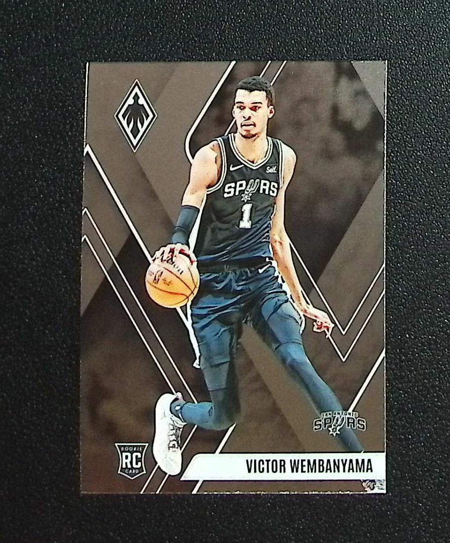Victor Wembanyama Rookie Card 2023-24 Panini Phoenix #256 San Antonio Spurs: Panini, Donruss Optic, Donruss Select, Prizm, Mosaic, Contenders, Revolution, Phoenix, NBA Hoops, Rookie NFL Sports Trading Cards, Silver, SP, SSP, Wave Prizms, Numbered Cards, Basketball sports Cards