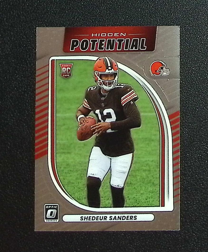 Shedeur Sanders Rookie Card Hidden Potential 2025 Donruss Optic #20 Cleveland Browns: Panini, Donruss Optic, & Donruss Select, Prizm, Mosaic, Contenders, Zenith, Phoenix, Illusions, Absolute, Rookie NFL Sports Trading Cards, SP, SSP, Cards, Football Cards for Sale Near Me, Superbowl &