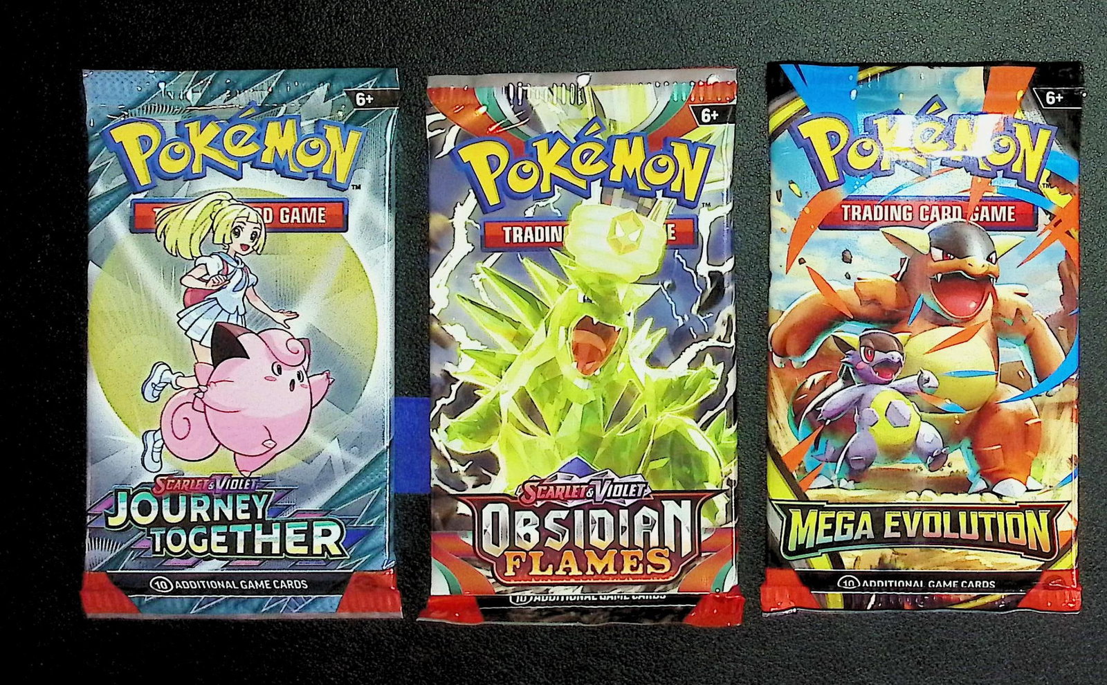 3 COUNT: 1 - Pokemon Journey Together, 1 - Obsidian Flames, & 1 - Mega Evolution Booster Packs: Pokemon Trading Card Game Cards, Charizard, Pikachu, Mewto, EX, Referse Holo, Holo Rare Cards, Secret Rare Cards, Full Art Cards, Evee, 3 Stars Ultra Rare Cards, Double Rare, Illustration Rare, Specia