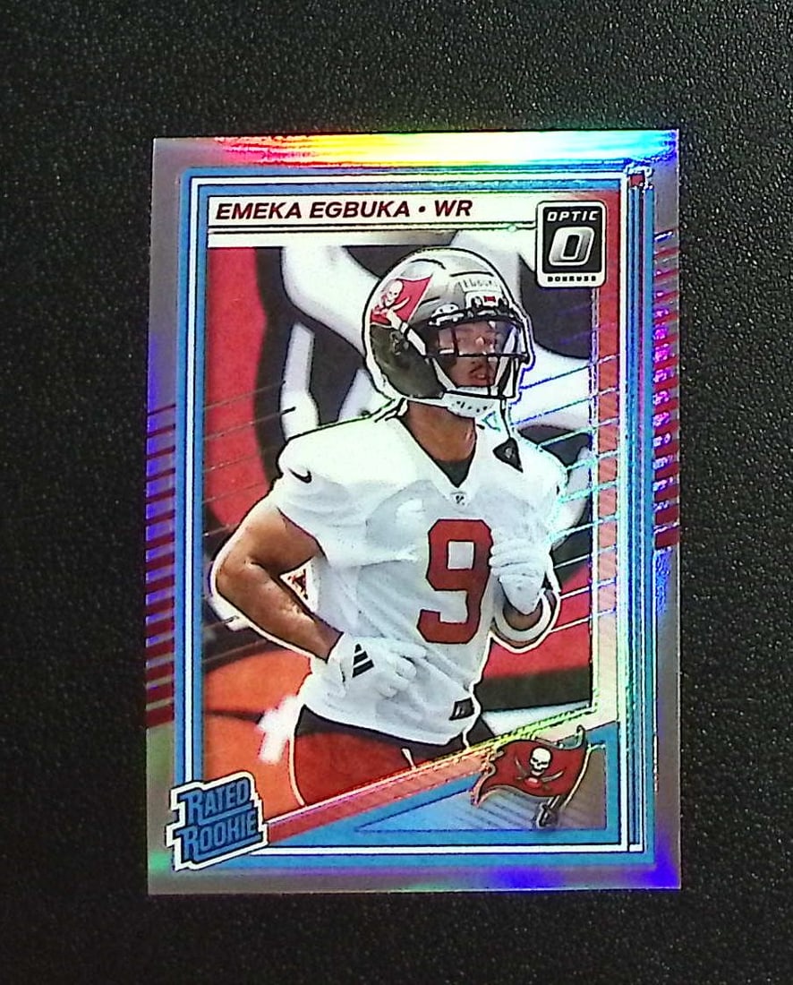 Emeka Egbuka Rookie Holo Prizm 2025 Donruss Optic #265 Tampa Bay Buccaneers: Panini, Donruss Optic, & Donruss Select, Prizm, Mosaic, Contenders, Zenith, Phoenix, Illusions, Absolute, Rookie NFL Sports Trading Cards, SP, SSP, Cards, Football Cards for Sale Near Me, Superbowl & 