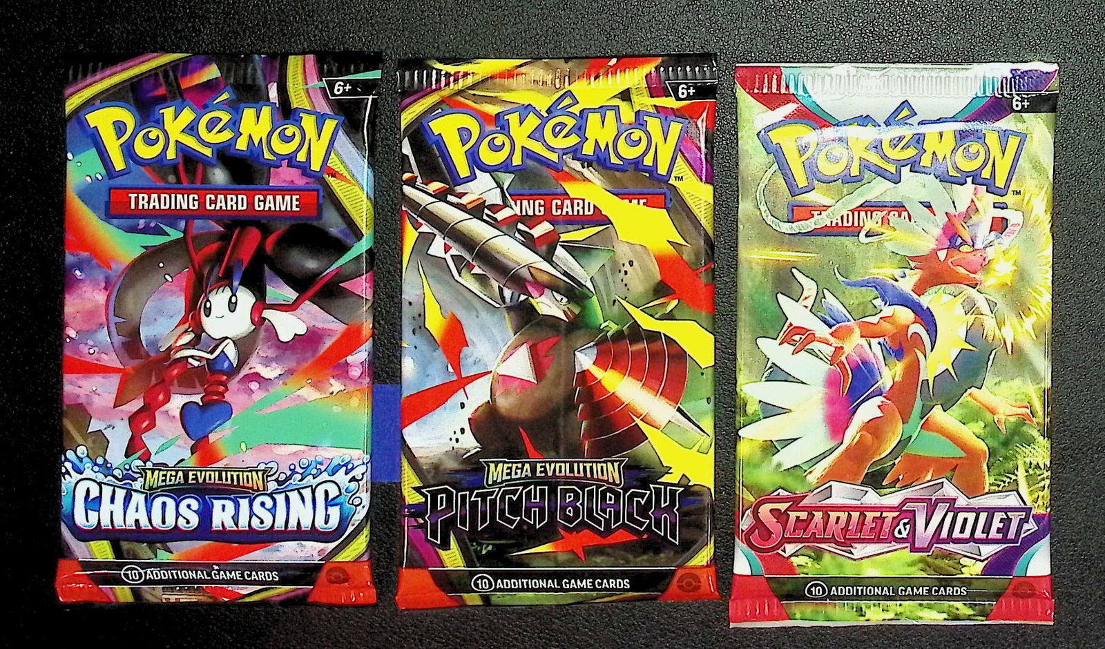 3 COUNT: 1 - Pokemon Chaos Rising, 1 - Pitch Black, 1 - Scarlet & Violet Booster Packs: Pokemon Trading Card Game Cards, Charizard, Pikachu, Mewto, EX, Referse Holo, Holo Rare Cards, Secret Rare Cards, Full Art Cards, Evee, 3 Stars Ultra Rare Cards, Double Rare, Illustration Rare, Specia