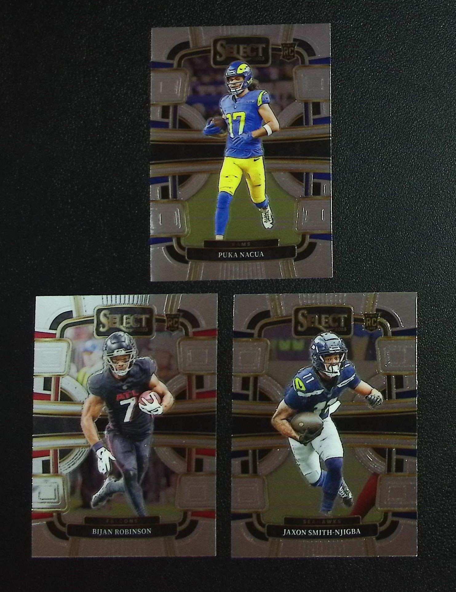 Lot of 3 2023 Select NFL Rookie Cards. Bijan Robinson, Puka Nacua, Jaxon Smith-Njigba: Panini, Donruss Optic, & Donruss Select, Prizm, Mosaic, Contenders, Zenith, Phoenix, Illusions, Absolute, Rookie NFL Sports Trading Cards, SP, SSP, Cards, Football Cards for Sale Near Me, Superbowl & 