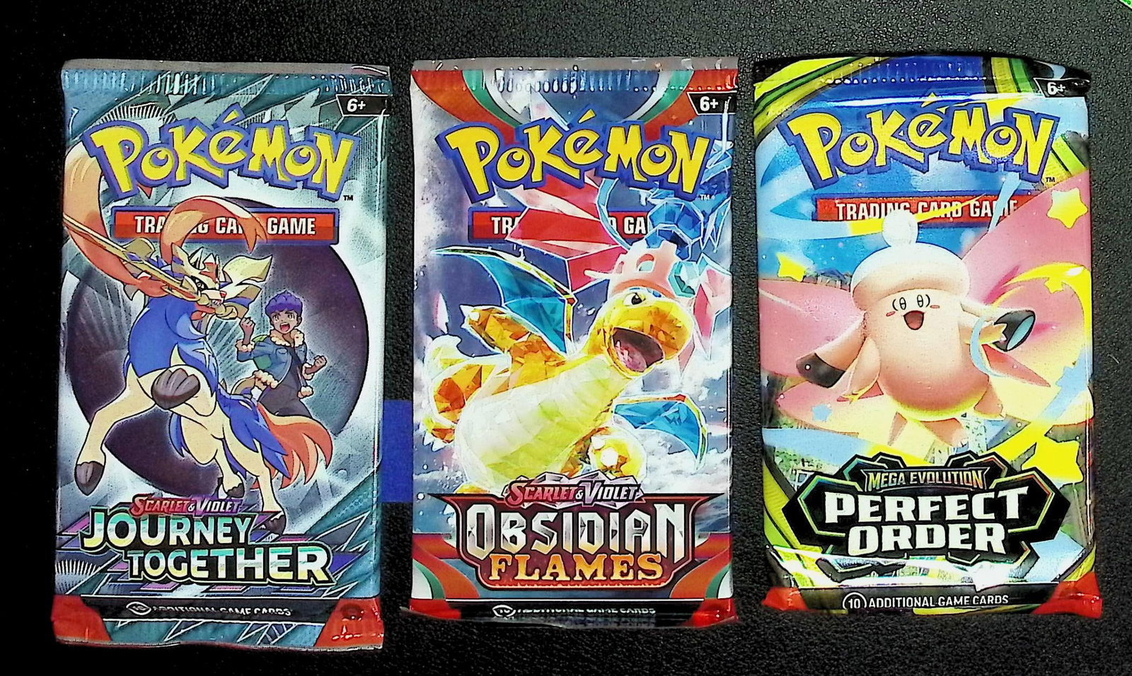3 COUNT: 1 - Pokemon Journey Together, 1 - Obsidian Flames, & 1 - Perfect Order Booster Packs: Pokemon Trading Card Game Cards, Charizard, Pikachu, Mewto, EX, Referse Holo, Holo Rare Cards, Secret Rare Cards, Full Art Cards, Evee, 3 Stars Ultra Rare Cards, Double Rare, Illustration Rare, Specia