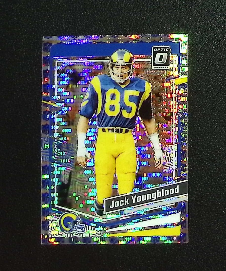 Jack Youngblood NFL Shield Prizm /32 2023 Donruss Optic #112 Rams: Panini, Donruss Optic, & Donruss Select, Prizm, Mosaic, Contenders, Zenith, Phoenix, Illusions, Absolute, Rookie NFL Sports Trading Cards, SP, SSP, Cards, Football Cards for Sale Near Me, Superbowl & 