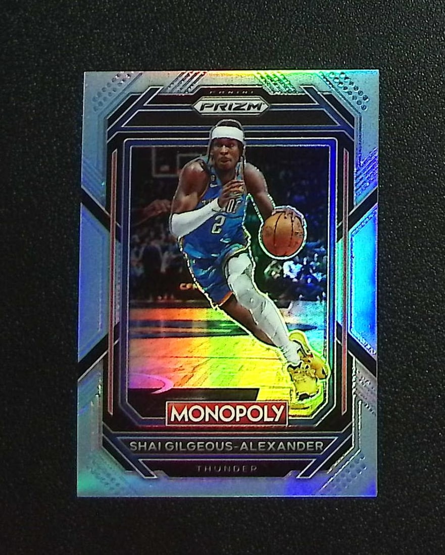 Shai Gilgeous-Alexander Light Blue Prizm /199 2022-23 Panini Prizm Monopoly #62: Panini, Donruss Optic, Donruss Select, Prizm, Mosaic, Contenders, Revolution, Phoenix, NBA Hoops, Rookie NFL Sports Trading Cards, Silver, SP, SSP, Wave Prizms, Numbered Cards, Basketball sports Cards