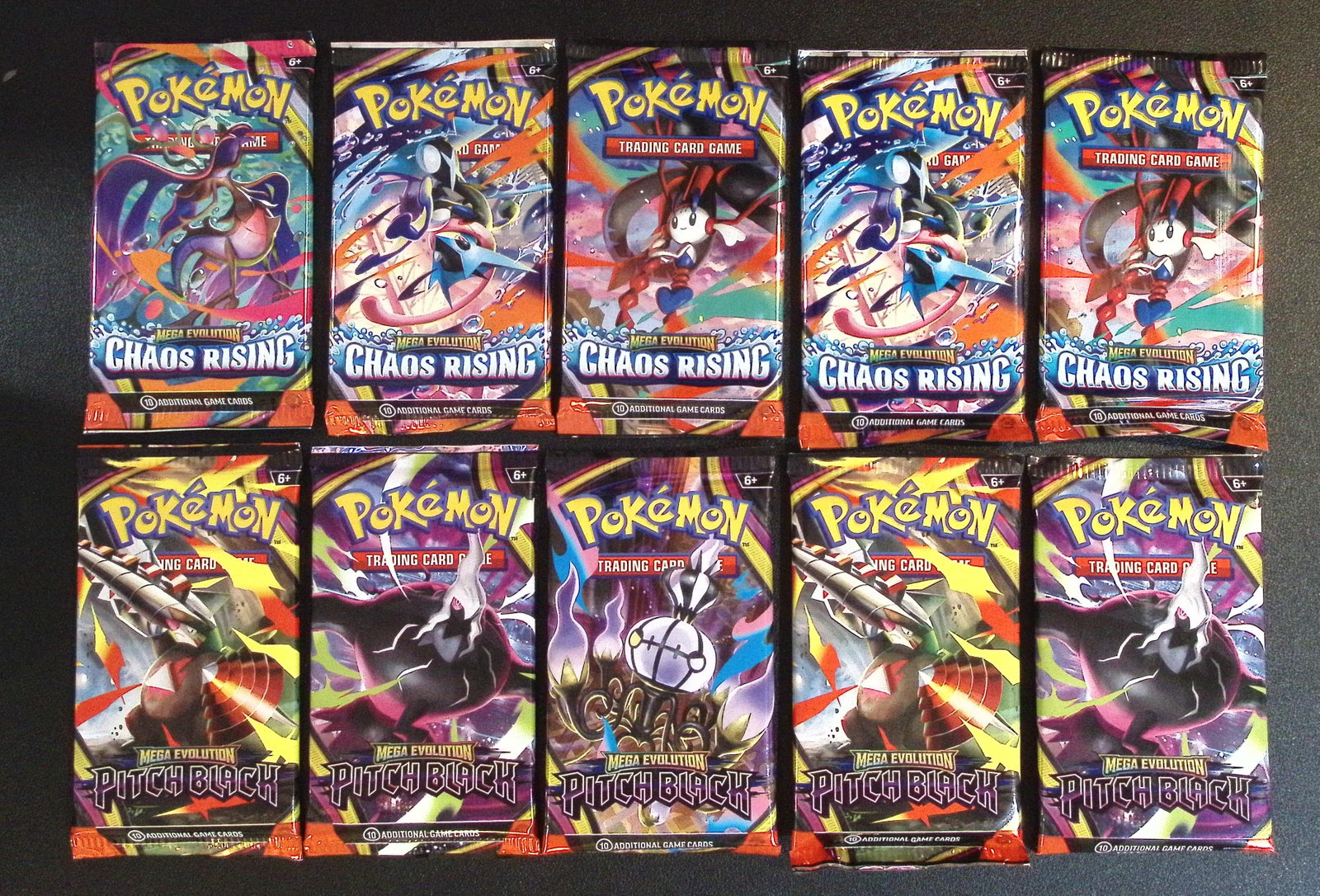 Lot of 10 Pokemon Booster Packs. 5 Chaos Rising & 5 Pitch Black: Pokemon Trading Card Game Cards, Charizard, Pikachu, Mewtwo, Reverse Holo, Holo Rare, Secret Rare Cards, Full Art Cards, Eevee, Ultra Rare Card, Illustration Rare, Special Illustration Rare SIR