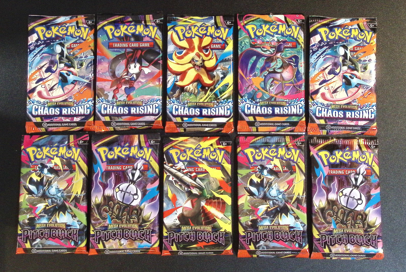 Lot of 10 Pokemon Booster Packs. 5 Chaos Rising & 5 Pitch Black: Pokemon Trading Card Game Cards, Charizard, Pikachu, Mewtwo, Reverse Holo, Holo Rare, Secret Rare Cards, Full Art Cards, Eevee, Ultra Rare Card, Illustration Rare, Special Illustration Rare SIR