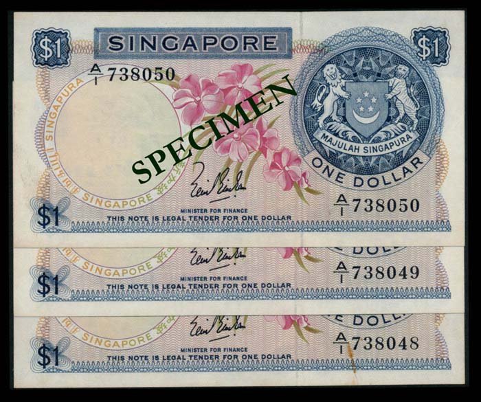 Singapore 3x$1 1967 LKS 1st prefix: Singapore $1, (1967), orchids, sign. Lim Kim San, serial nos. A/1 738048 (with rusty paper clip stain) to 050, 3 consecutive 1st prefix notes, stains, ageing, GEF. (3)