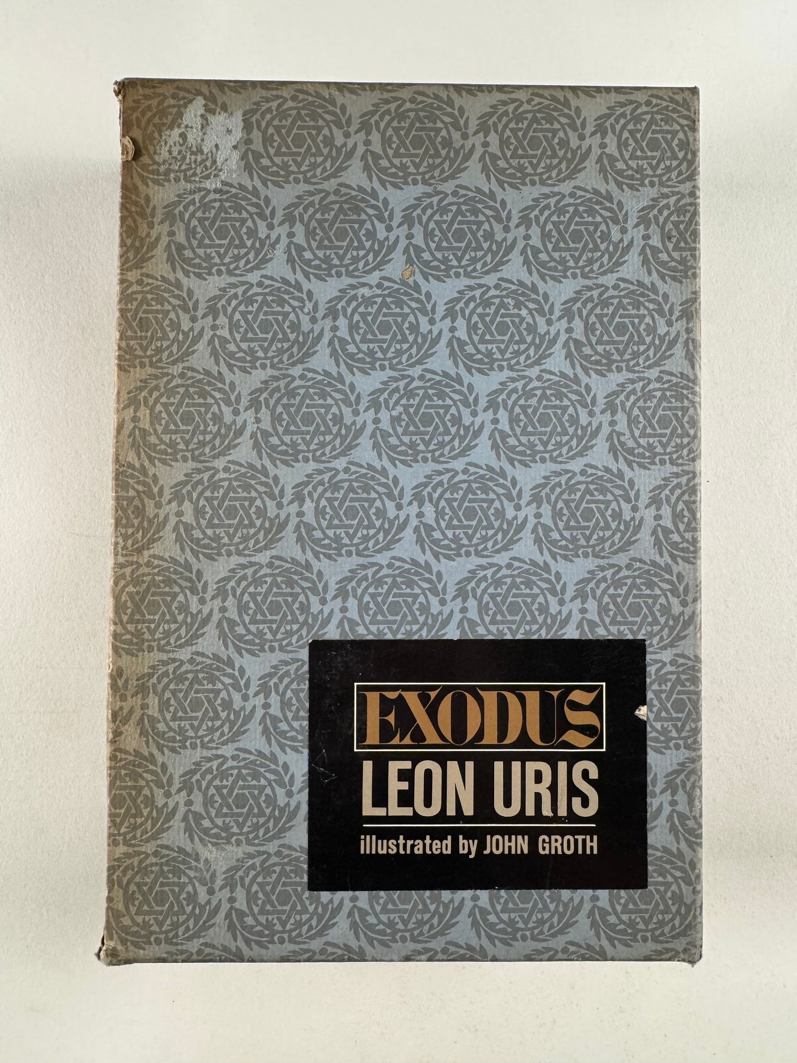 Exodus by Leon Uris, Illustrated by John Groth, Doubleday 1962 Hardcover Book in Slipcase: Exodus is a historical novel by American novelist Leon Uris about the founding of the State of Israel beginning with a compressed retelling of the voyages of the 1947 immigration ship Exodus and descr
