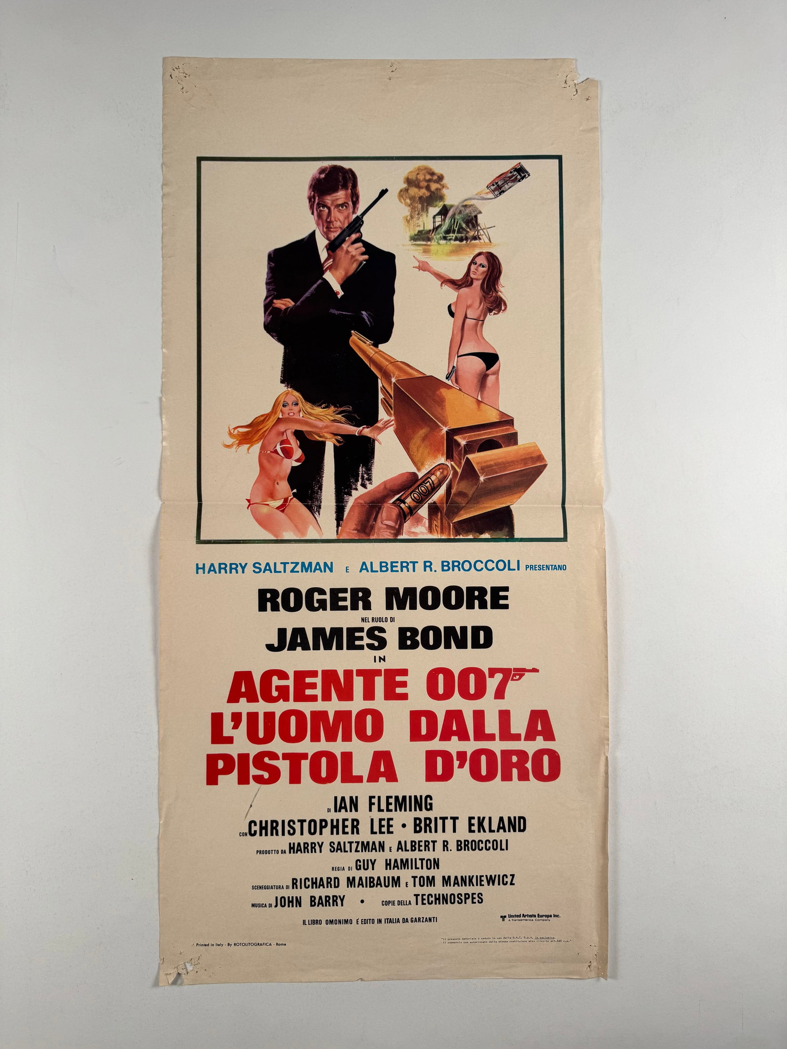 The Man with the Golden Gun 1974 Italian Locandina Original Movie Poster 13x27.5: The Man with the Golden Gun is a 1974 spy film, the ninth in the James Bond series produced by Eon Productions and the second to star Roger Moore as the fictional MI6 agent James Bond. A loose adaptat
