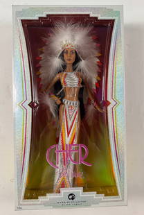 Cher Bob Mackie Barbie Collector Doll with Feather Headress New in Box: The name Cher is synonymous with sensational shows, super stardom and glamorous, over-the-top style. With the help of designer Bob Mackie, Cher has graced the stage in one-of-a-kind outfits that are a