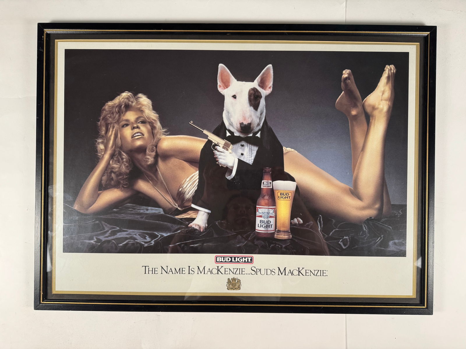 Framed Bud Light Spuds MacKenzie Poster, James Bond 007 Themed Mounted in Frame 29.5x21: Gil had a huge collection of original Spuds MacKenzie memorabailia. This poster was mounted on foam board and framed.