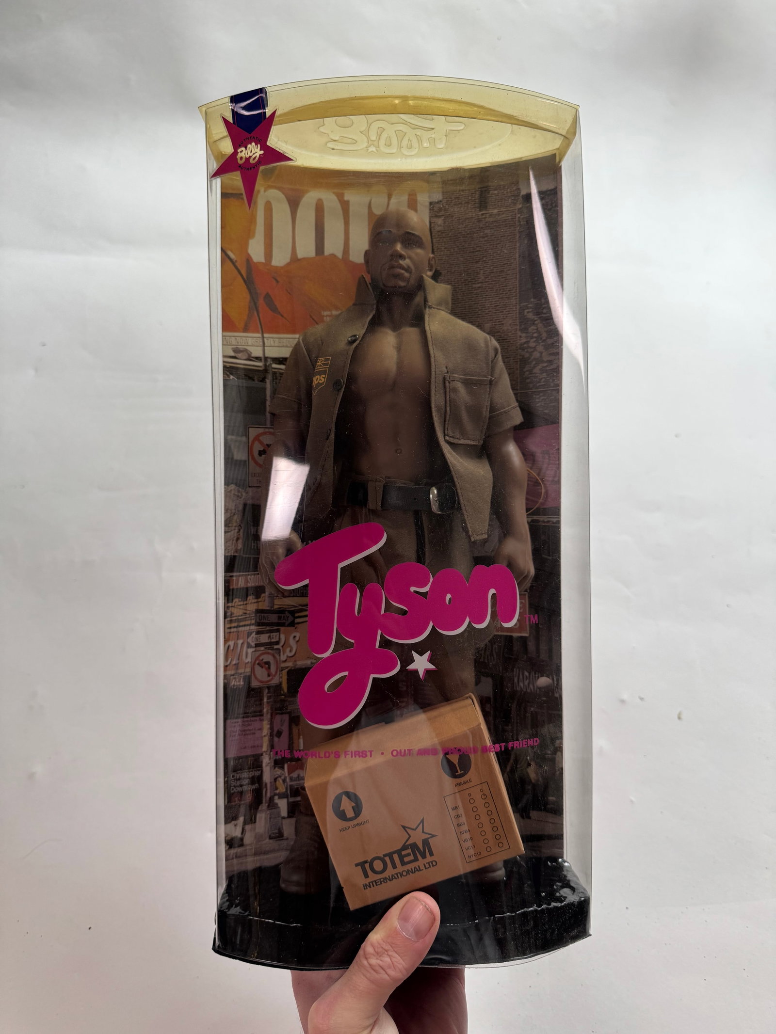 Billy's Best Friend Tyson First Out and Proud Gay Doll 1999 Gay Interest UPS BPS Driver Action: In 1999, Totem International received major publicity when they announced the launch of Tyson. Tyson, promoted as Billy and Carlos' best friend and the first black, gay doll. Media coverage went world
