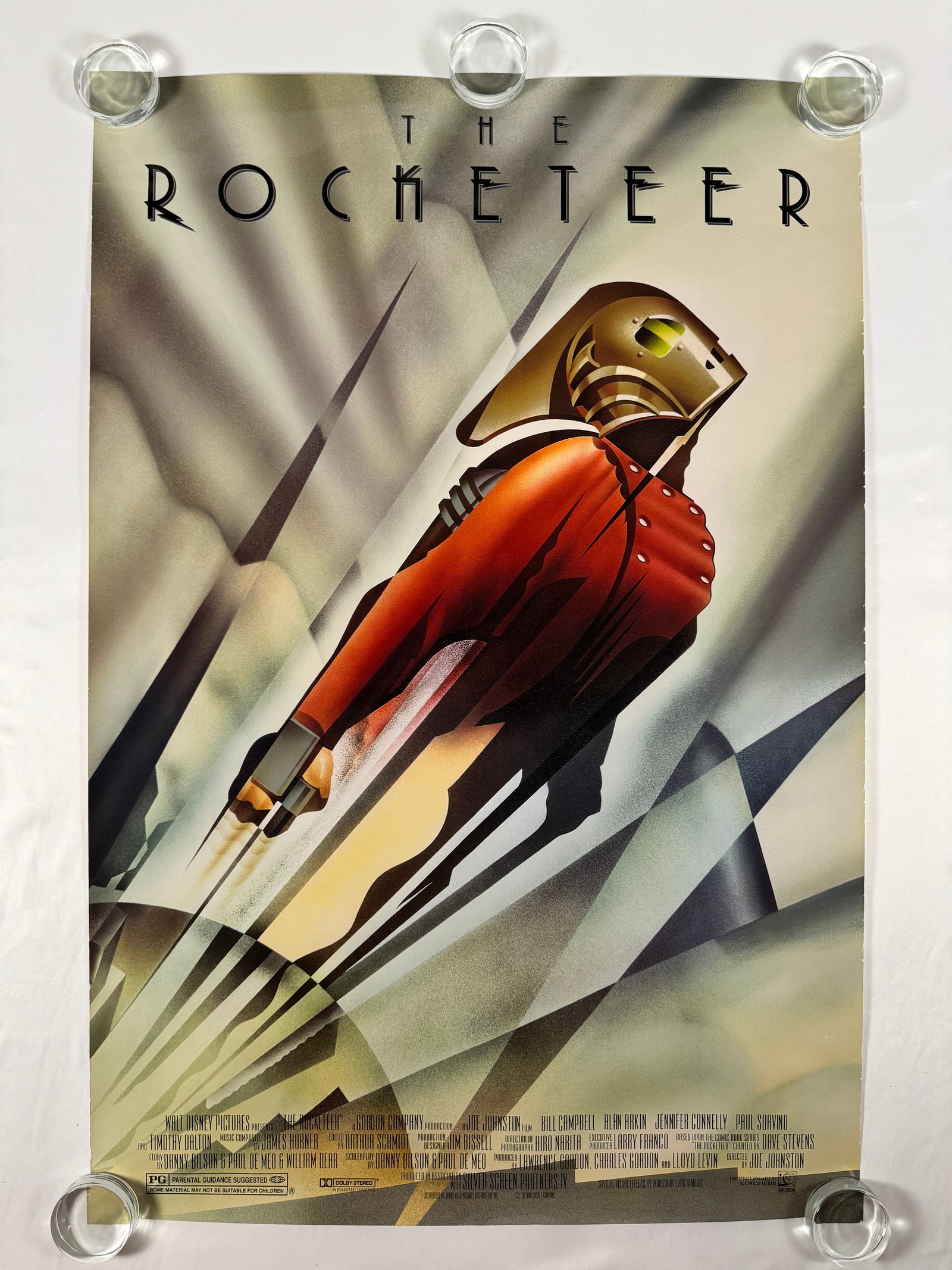 The Rocketeer 1991 DSS Original One Sheet Movie Poster 27"x40 Disney: The Rocketeer (released internationally as The Adventures of the Rocketeer) is a 1991 American superhero film from Walt Disney Pictures and released as a Touchstone Pictures film internationally. It w