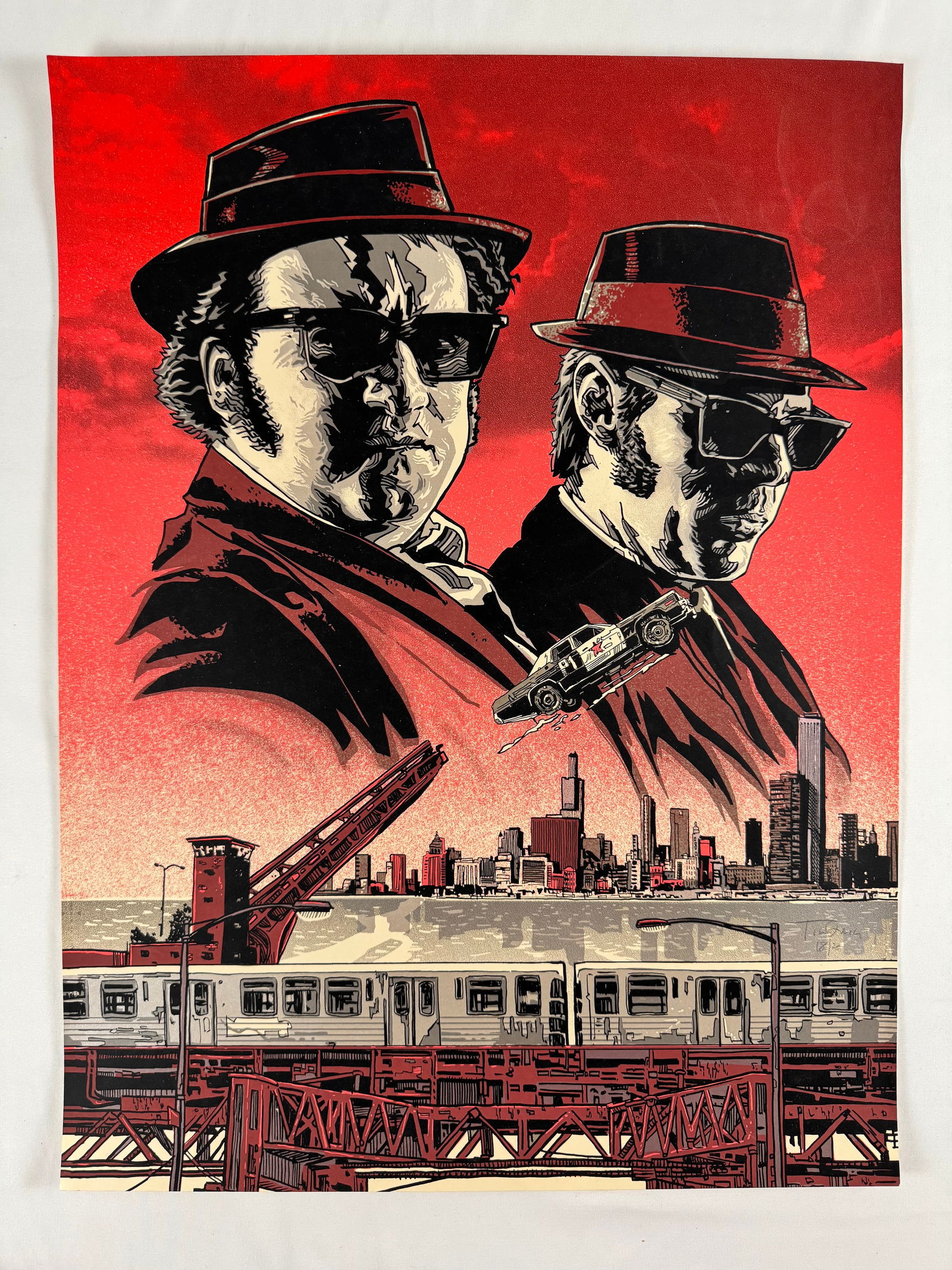 Blues Brothers Elwood and Joliet Jake (Variant) by Tim Dolye Signed Numbered 18/25 Original Movie: The Blues Brothers is a 1980 American musical action comedy film directed by John Landis.[4] It stars John Belushi as "Joliet" Jake Blues and Dan Aykroyd as his brother Elwood, characters developed fr