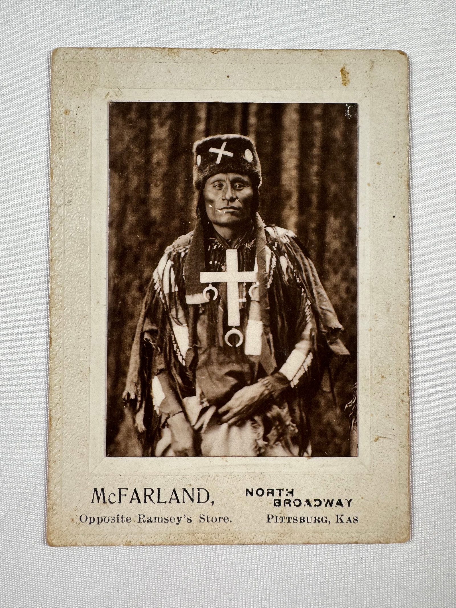 Little Wolf by McFarland Pittsburg Kansas Photography Studio Original Photograph Small Cabinet Card: Little Wolf (Cheyenne: sometimes transcribed Ohcumgache or Ohkomhakit, more correctly translated Little Coyote, c.1820—1904) was a Northern Só'taeo'o Chief and Sweet Medicine Chief of the Northern 