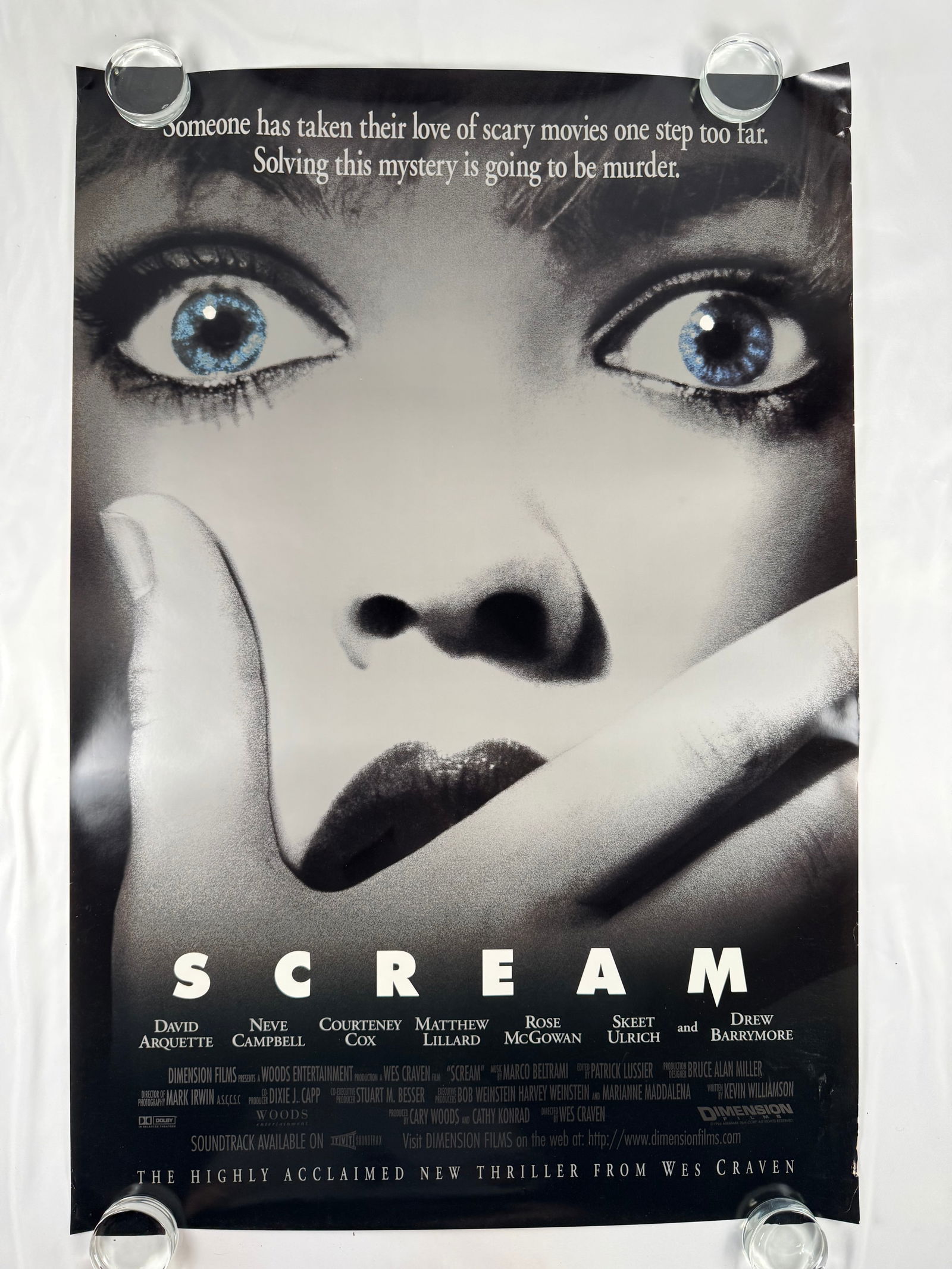 Original 1996 “Scream" One Sheet 27"x40" Movie Poster: Scream (1996) is a self-aware, genre-reviving horror film directed by Wes Craven that blends slasher thrills with sharp satire of scary-movie tropes. The story follows a group of teenagers in the town