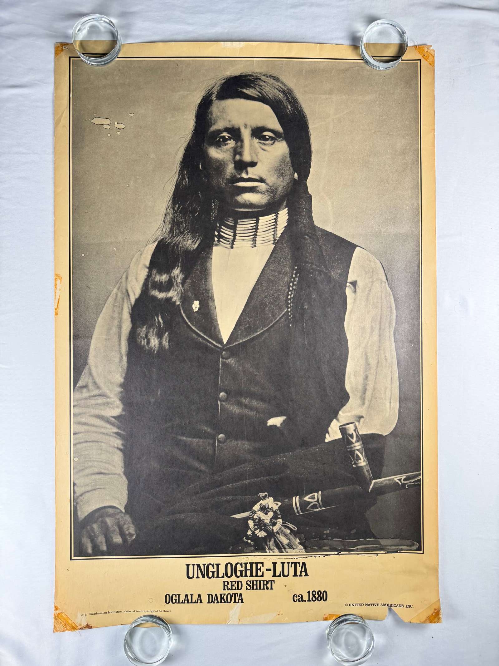Ungloghe-Luta Red Shirt Oglala Dakota 1880 Poster Native American: Poster version of a historical photograph of Ungloghe-Luta Red Shirt of the Oglala Dakota. Smithsonian Institution National Anthropological Archives. © UNITED NATIVE AMERICANS INC.