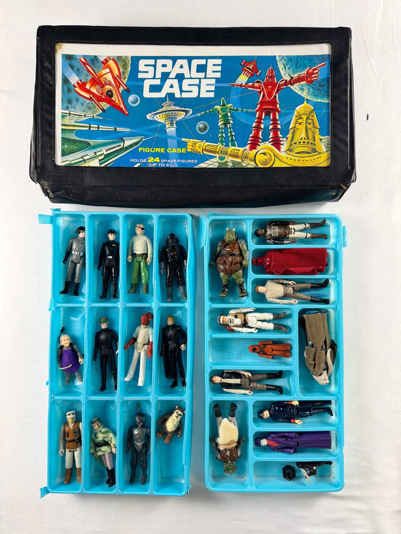 Star Wars Space Case Figure Carrying Case with Action Figures: Space Case branded carrying case designed to hold up to 24 action figures. Includes blue trays with assorted space-themed action figures. To the best of our knowledge, all characters are mixed from th