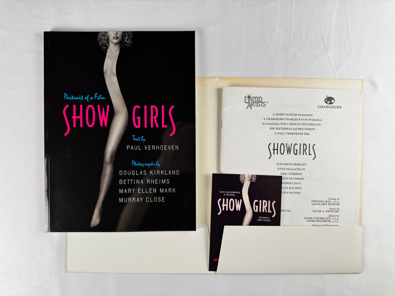 Showgirls Film Press Kit and Promotional Materials: Press kit for the film Showgirls including printed promotional items. Issued by United Artists for media and publicity use.