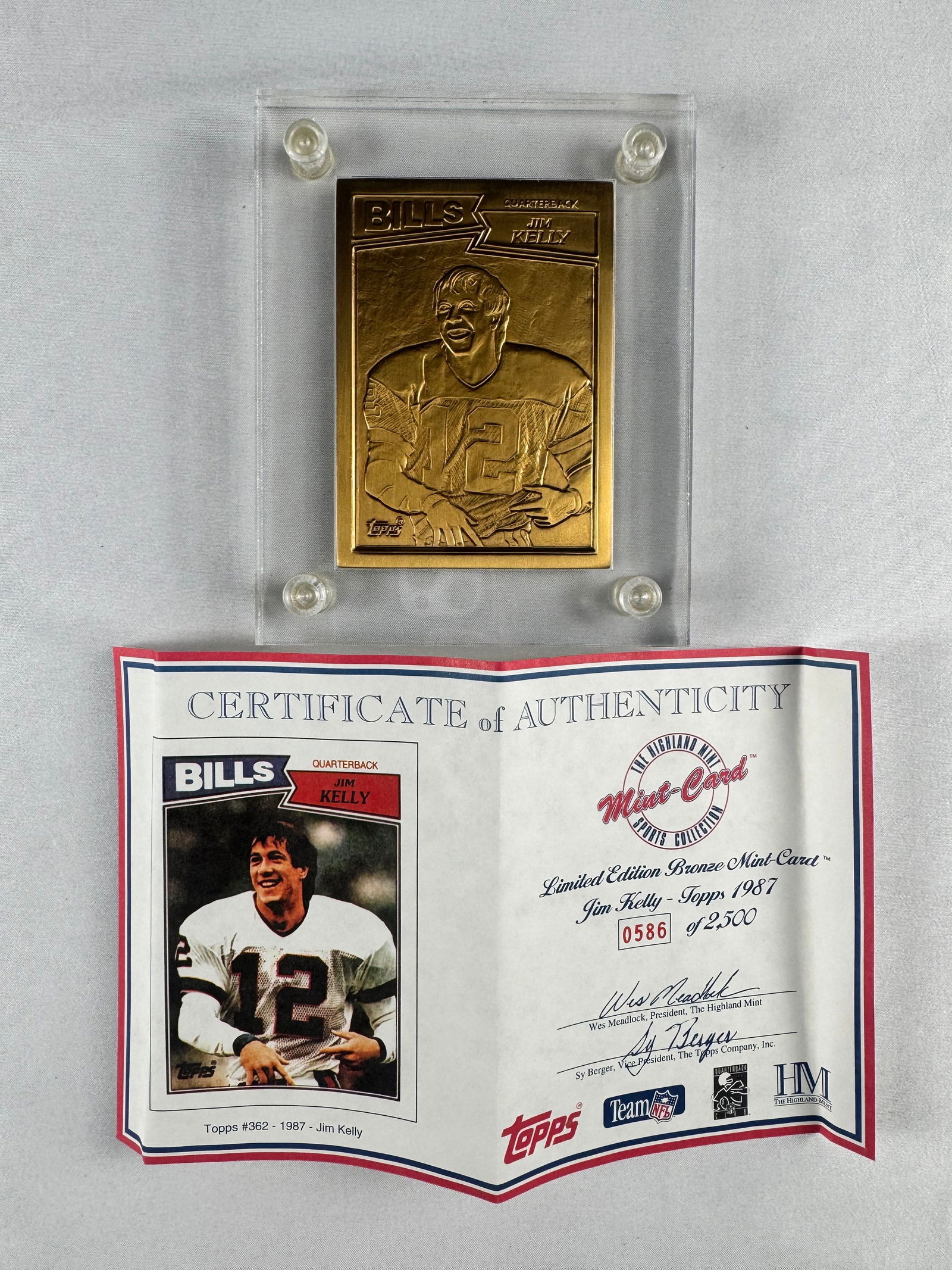 Jim Kelly Buffalo Bills 1987 Topps Bronze Mint Card with COA: Bronze Mint Card featuring Jim Kelly issued by The Highland Mint in 1987. Includes original Certificate of Authenticity.
