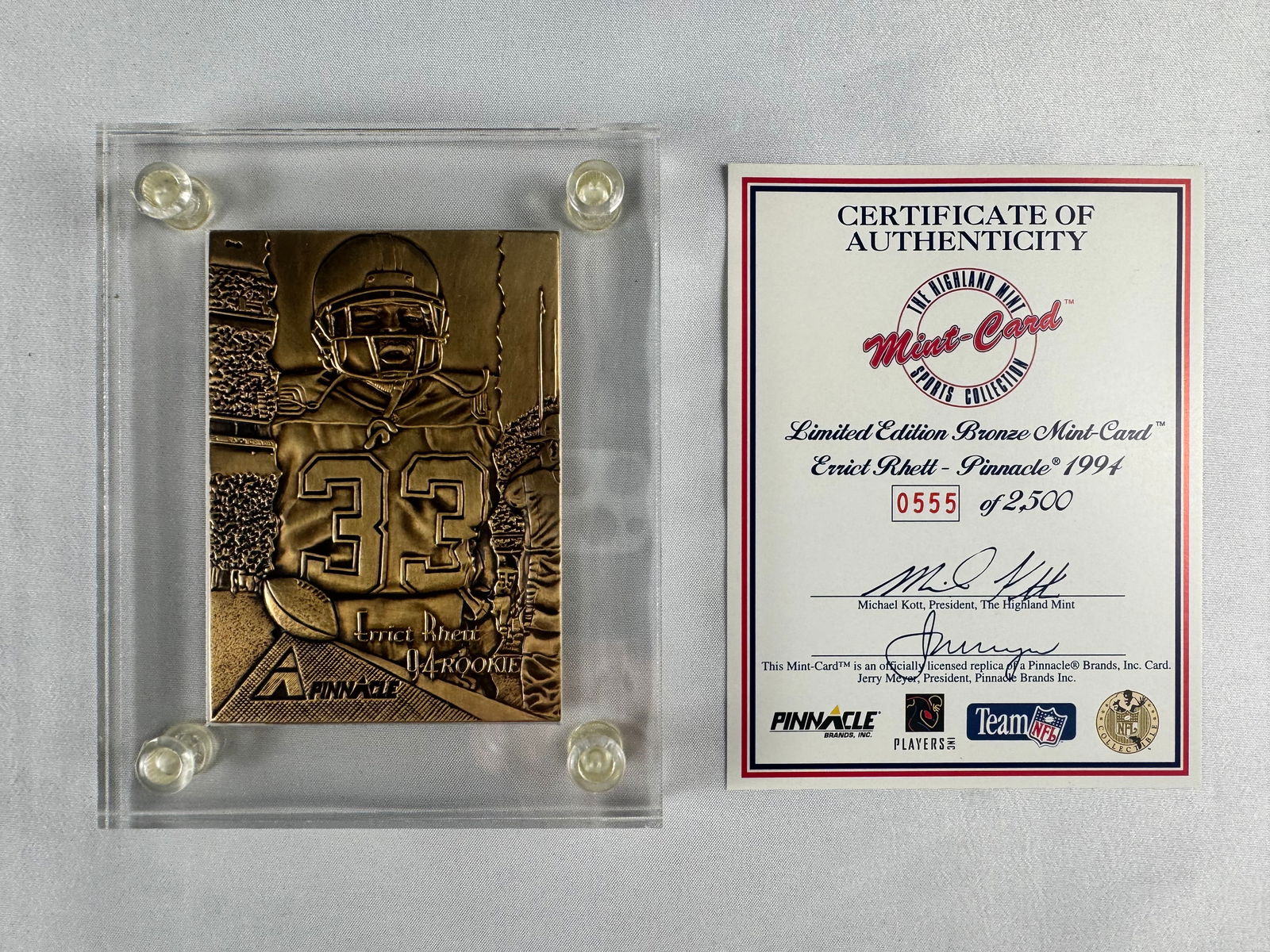 Errict Rhett 1994 Pinnacle Bronze Mint Rookie Card with COA: Bronze Mint rookie card featuring Errict Rhett issued by The Highland Mint in 1994. Includes original Certificate of Authenticity.