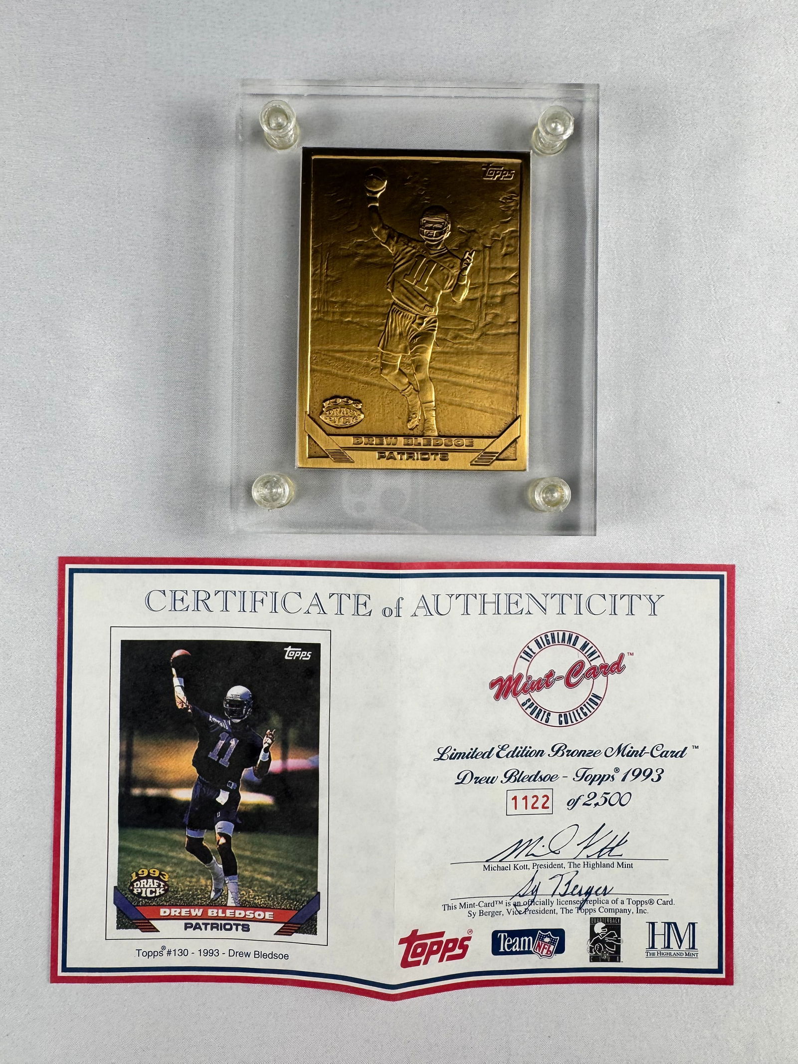 Drew Bledsoe Topps 1993 Limited Edition Bronze Mint Card with COA: Bronze relief card featuring Drew Bledsoe based on his 1993 Topps card. Issued by The Highland Mint and numbered with matching certificate of authenticity.