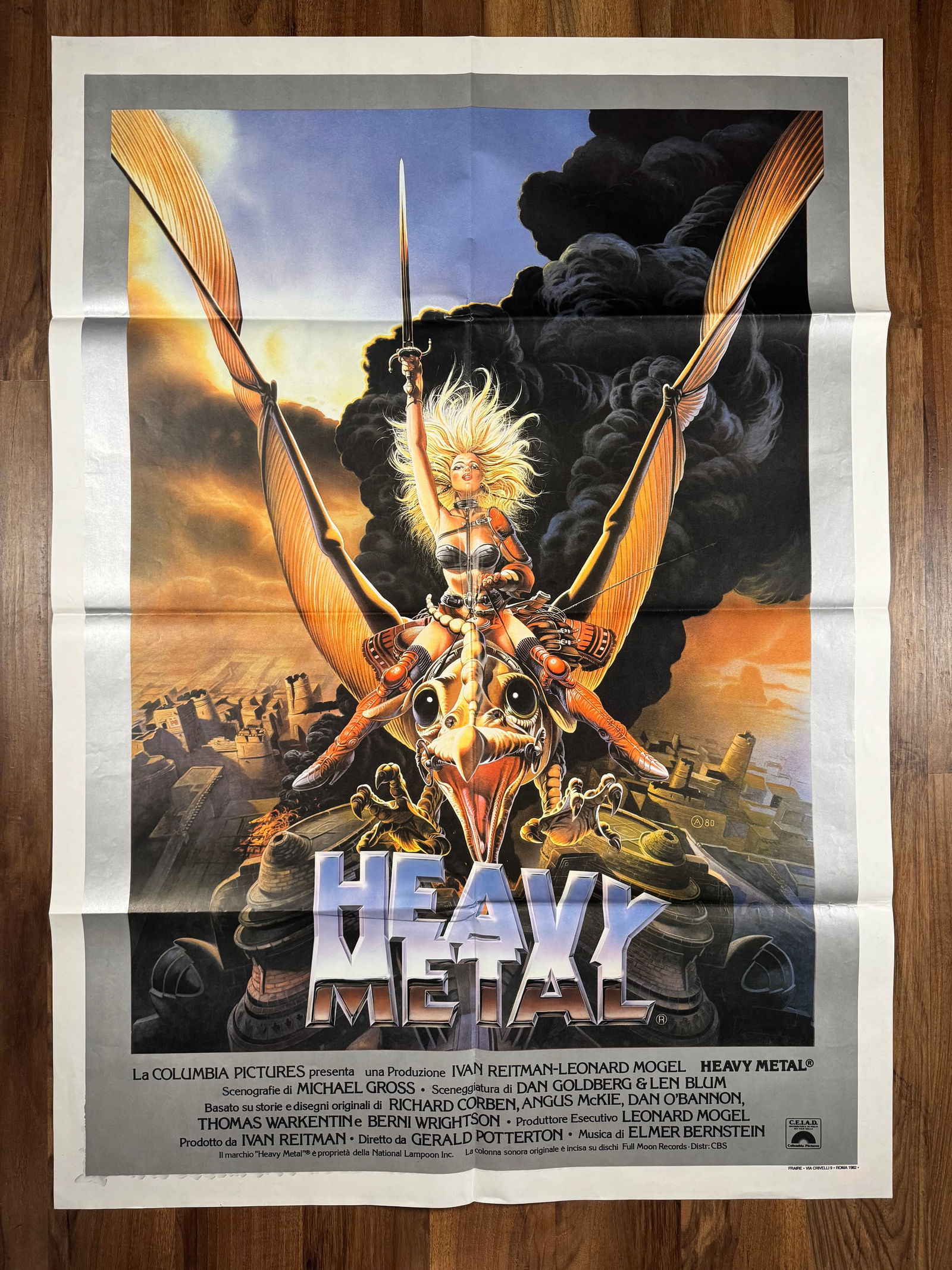 Heavy Metal 1981 Large 2 Fogli Italian 1P Folded Movie Poster 39"x55" Cult Classic: Heavy Metal is a 1981 Canadian adult animated science fantasy anthology film directed by Gerald Potterton (in his directorial debut) and produced by Ivan Reitman and Leonard Mogel, who also was the pu