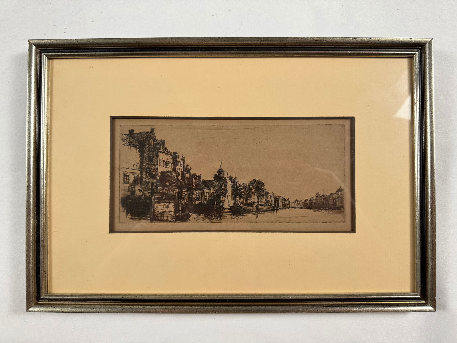 Dordrechy Holland by Charles A. Vanderhoof Framed 8.5x4 (20): Charles A. Vanderhoof (1853–1918) was a 19th-century American etcher and illustrator known for his finely detailed views of cities, landscapes, and architectural subjects. Working during the America